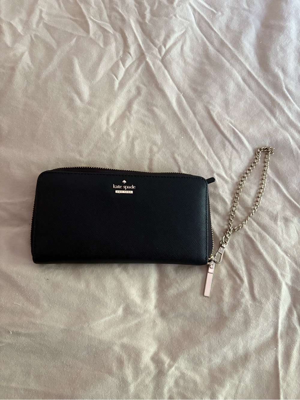 kate spade black zip-around wristlet with silver chain